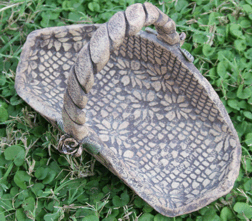 ceramic basket imprinted with crochet