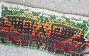 dotty knit rug, with i-cord border