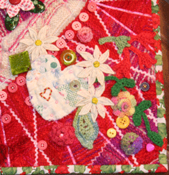 Valentine quilt with buttons and crocheted flowers