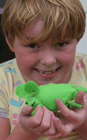 Ella and the felt mouse she made