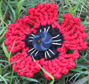 a simple crocheted poppy
