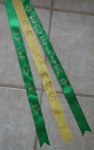 write on ribbon with glitter and glue and set aside to dry