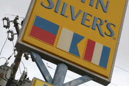 nautical flags spell E-A-T at Long John Silver’s