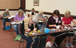 hard at work making polymer clay buttons