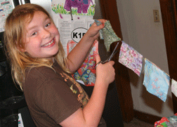Ella cuts patches