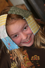 Ella wears patches